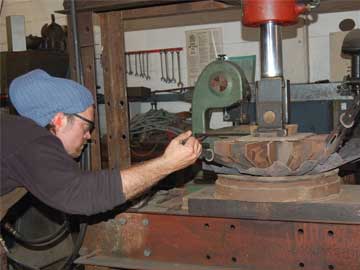Proven Processes shows people looking through construction materials